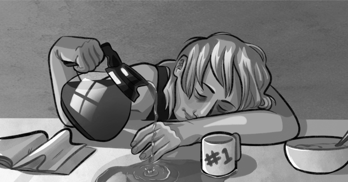 A woman sleeps at a table holding her coffee